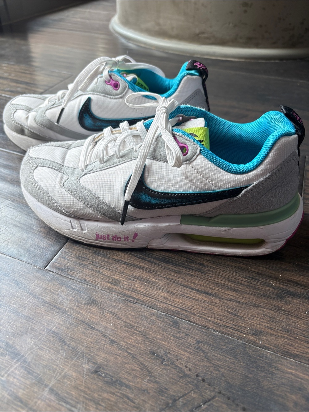 Nike Kids White Sneakers with Teal and Black Accents